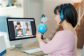 asianwomanteacherteachinggeographyviavideoconferenceelearning-16580930